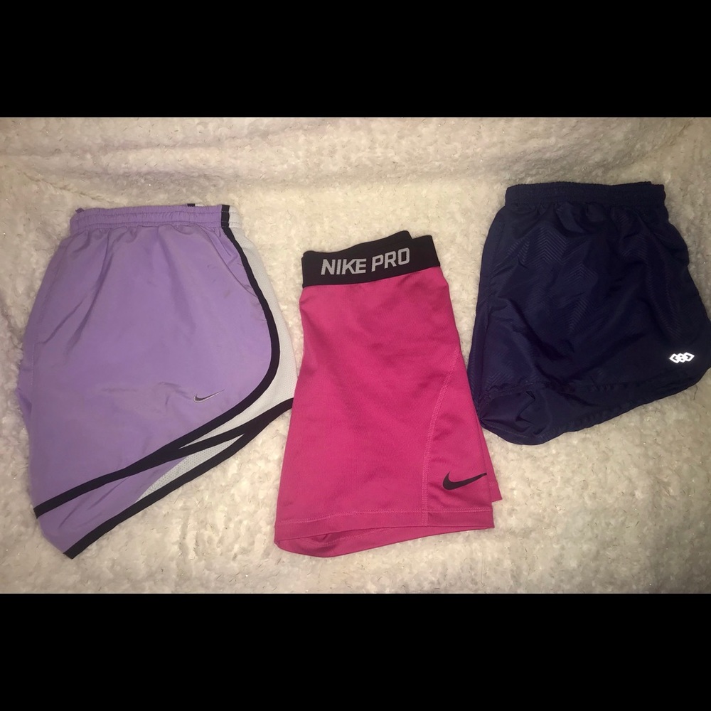 Pink Nike compression shorts